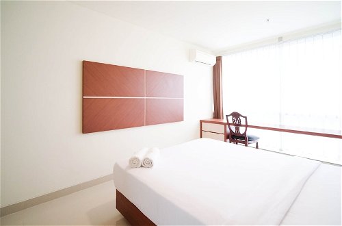 Photo 2 - Best Location And Comfy 1Br At Praxis Apartment