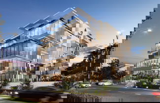 Photo 1 - Quao Realty - The Essence