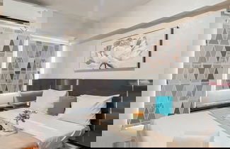 Foto 3 - Warm and Homey Studio at Podomoro Golf View Apartment