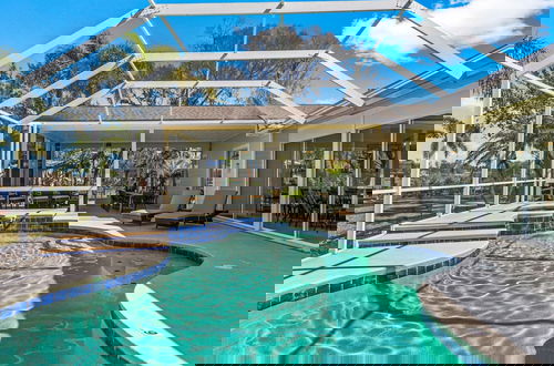 Photo 50 - Luxe Waterfront Hideaway w Pool & Pirate Ship Dock