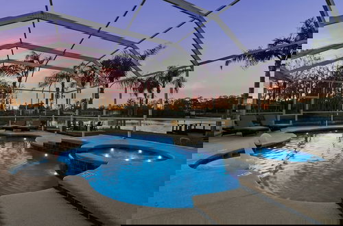 Photo 23 - Luxe Waterfront Hideaway w Pool & Pirate Ship Dock
