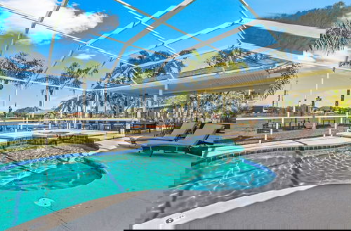 Photo 8 - Luxe Waterfront Hideaway w Pool & Pirate Ship Dock