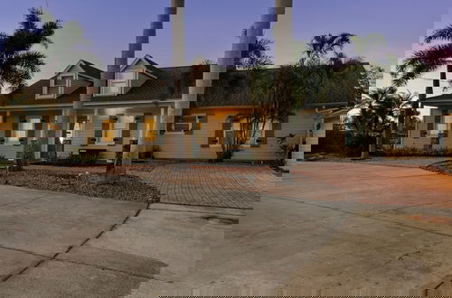 Photo 19 - Luxe Waterfront Hideaway w Pool & Pirate Ship Dock