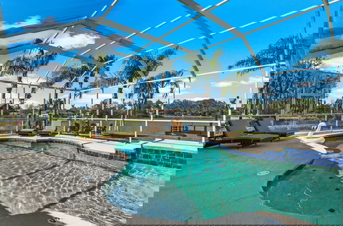 Photo 10 - Luxe Waterfront Hideaway w Pool & Pirate Ship Dock