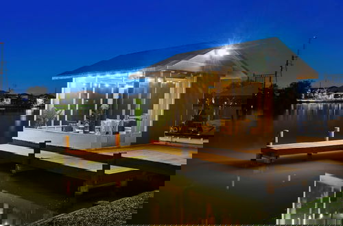 Photo 41 - Luxe Waterfront Hideaway w Pool & Pirate Ship Dock