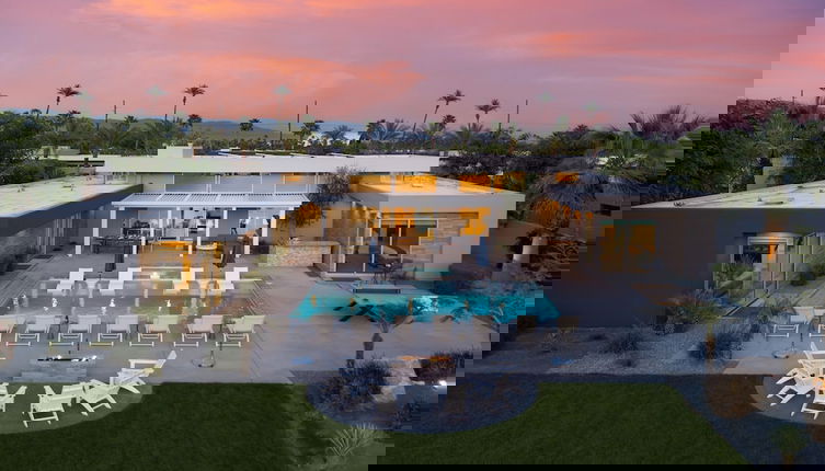 Photo 1 - Polo Villa 3 by Avantstay Features Expansive Putting Green Pool Spa Outdoor Firepit 260328 6 Bedrooms