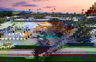 Photo 1 - Polo Villa 5 by Avantstay Outdoor Bocce Ball Fire Pit BBQ Pool Spa 260332 6 Bedrooms