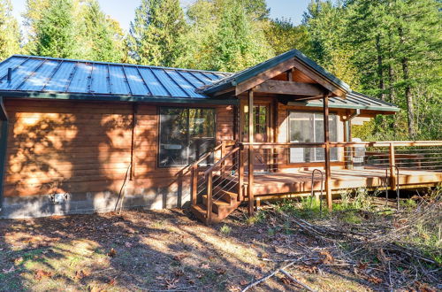 Photo 14 - Riverfront Rhododendron Cabin Rental w/ Deck