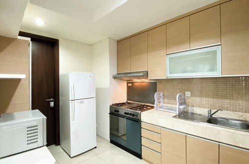 Foto 11 - Modern Look And Comfort 2Br Kemang Village Apartment