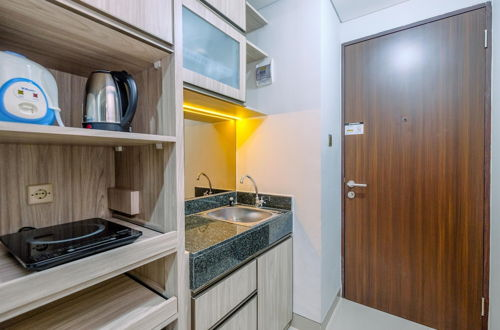 Photo 8 - Warm And Minimalist Studio Room Transpark Cibubur Apartment