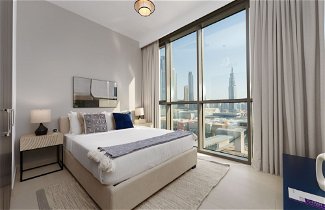 Foto 3 - Maison Privee - Luxury Apt with Burj Khalifa Vw & Direct Mall Access