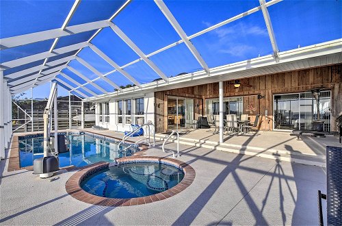 Photo 19 - Stunning Bayfront Retreat With Pool, Spa & Dock