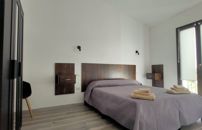 Suite Apartments Porto Pino I4mori - Foto 5