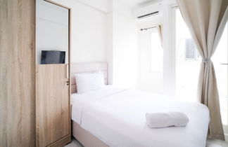 Photo 3 - Cozy Living Studio At Puncak Cbd Apartment