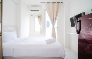 Photo 2 - Cozy Living Studio At Puncak Cbd Apartment