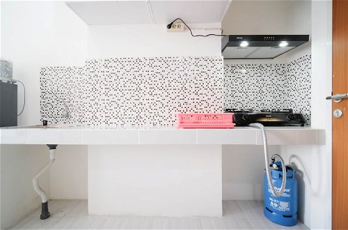 Photo 9 - Cozy Living Studio At Puncak Cbd Apartment