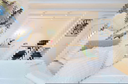 Foto 5 - Karma Suites by Dominium