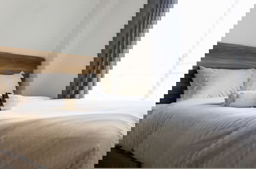 Foto 1 - Minimalist and New Furnished Studio Apartment at Springwood Residence