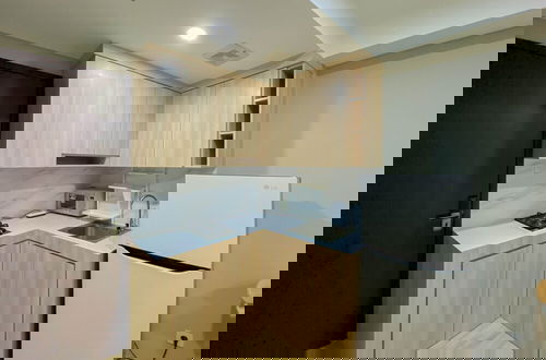 Foto 10 - Spacious And Warm Studio Daan Mogot City Apartment
