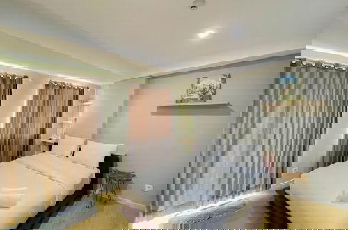 Foto 7 - Spacious And Warm Studio Daan Mogot City Apartment