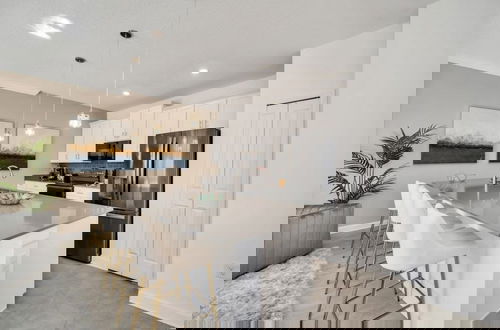 Photo 12 - Amazing Story Lake Town Home With Pool 4 Bedroom Townhouse by RedAwning