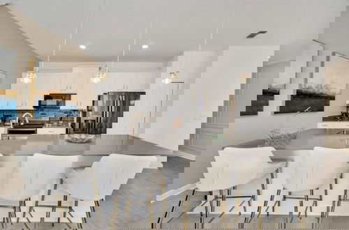 Photo 14 - Amazing Story Lake Town Home With Pool 4 Bedroom Townhouse by RedAwning