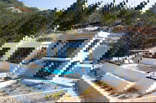 Foto 6 - Mandevilla Hillside Luxury Villas
