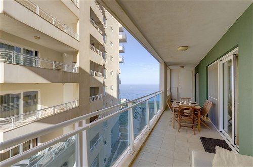 Photo 10 - Luxury Apt with Side Sea Views & Pool, Top Location