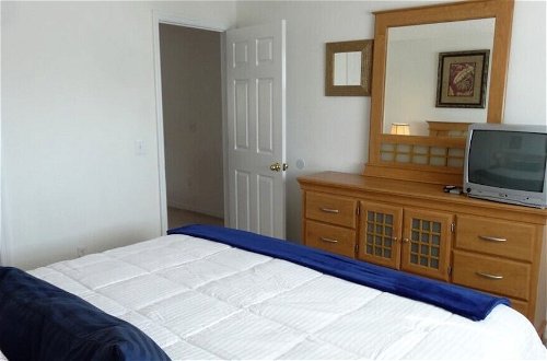 Photo 11 - 5 Beds With Private Pool Near Disney Parks 4703 5 Bedroom Home by RedAwning