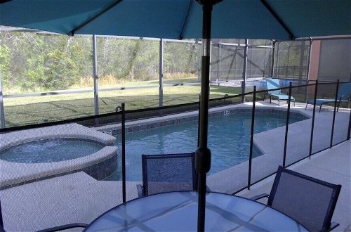Photo 24 - 5 Beds With Private Pool Near Disney Parks 4703 5 Bedroom Home by RedAwning
