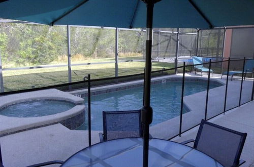 Photo 25 - 5 Beds With Private Pool Near Disney Parks 4703 5 Bedroom Home by RedAwning