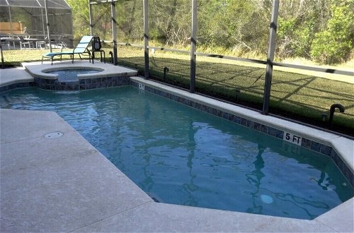 Photo 27 - 5 Beds With Private Pool Near Disney Parks 4703 5 Bedroom Home by RedAwning