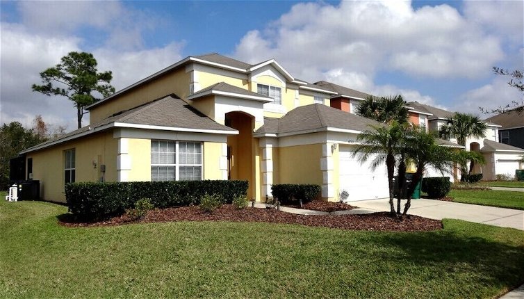 Photo 1 - 5 Beds With Private Pool Near Disney Parks 4703 5 Bedroom Home by RedAwning