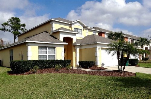 Photo 1 - 5 Beds With Private Pool Near Disney Parks 4703 5 Bedroom Home by RedAwning