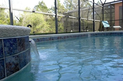 Photo 26 - 5 Beds With Private Pool Near Disney Parks 4703 5 Bedroom Home by RedAwning