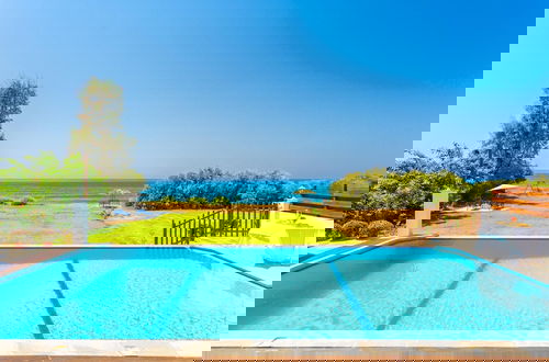 Photo 79 - Kalisto Beach Villa Large Private Pool Walk to Beach Sea Views A C Wifi Car Not Required - 2137
