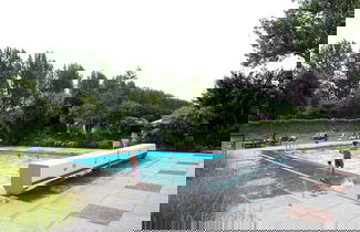 Foto 1 - Casa con 2 camere da letto a Noord-Scharwoude con piscina e giardino