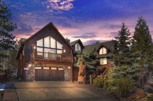 Photo 1 - Mighty Bear Manor by Avantstay Elevated Cabin w/ Pine Tree Views, Hot Tub & Pool Table