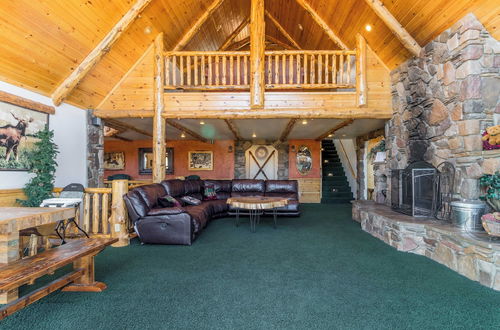 Photo 8 - Mighty Bear Manor by Avantstay Elevated Cabin w/ Pine Tree Views, Hot Tub & Pool Table