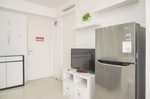 Photo 23 - Restful 2Br Bassura City Apartment Near Shopping Mall