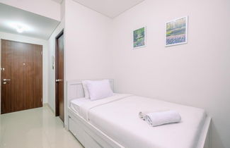 Photo 3 - Minimalist And Cozy Studio (No Kitchen) Transpark Cibubur Apartment