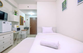 Foto 1 - Minimalist And Cozy Studio (No Kitchen) Transpark Cibubur Apartment