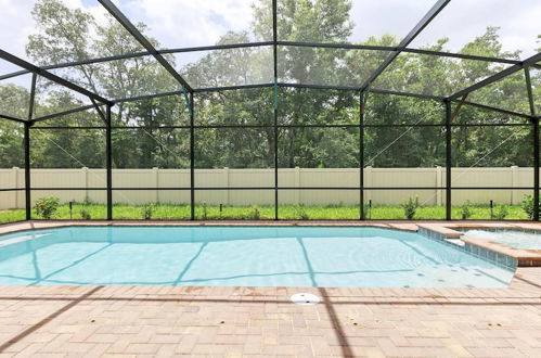 Photo 3 - Stunning 9BR Villa w South-facing Pool Near Disney