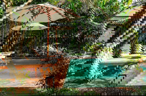 Foto 35 - Hijau Villa by EVDEkimi - Charming 2BR escape with Pool, Outdoor Lounge, Lush Garden