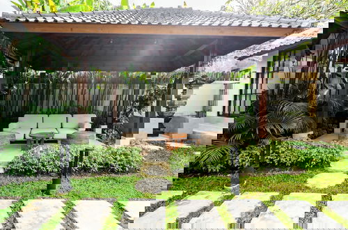 Foto 32 - Hijau Villa by EVDEkimi - Charming 2BR escape with Pool, Outdoor Lounge, Lush Garden