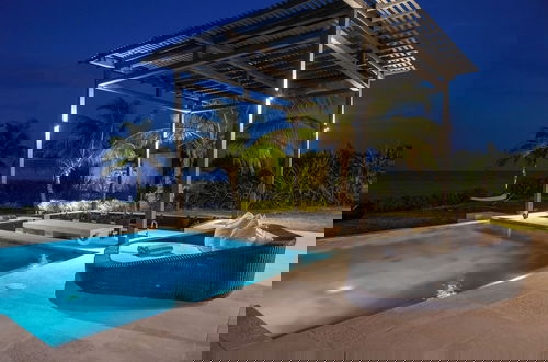 Photo 13 - Oceanfront Oasis: Renovated Villa With Pool