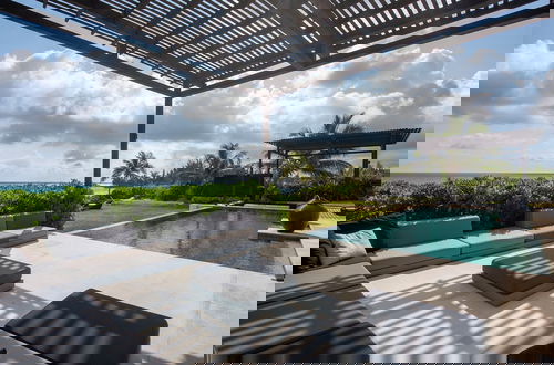 Photo 12 - Oceanfront Oasis: Renovated Villa With Pool