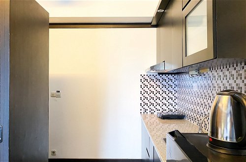 Photo 11 - Homey And Warm Studio At Metropark Condominium Jababeka Apartment