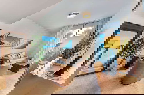Foto 1 - Condo Close to the Beach With Rooftop Pool & Gym