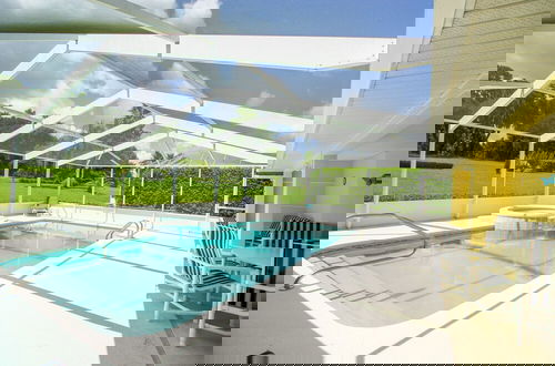 Photo 17 - Beautiful & Sunny Pool With Golf View 4 Bedroom Home by RedAwning